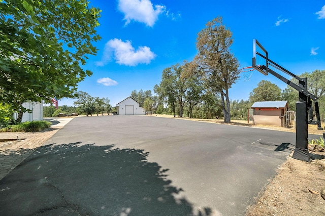 23795 Deer Canyon Rd, Millville, CA 96062 - view of sport court with a shed and community basketball court