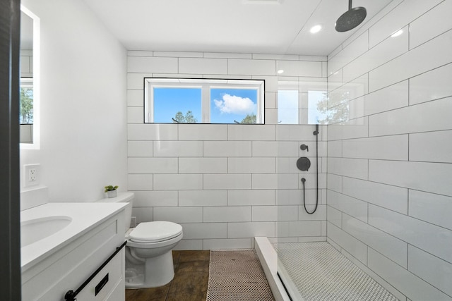 23795 Deer Canyon Rd, Millville, CA 96062 - full bathroom featuring vanity, a tile shower, recessed lighting, and tile patterned flooring