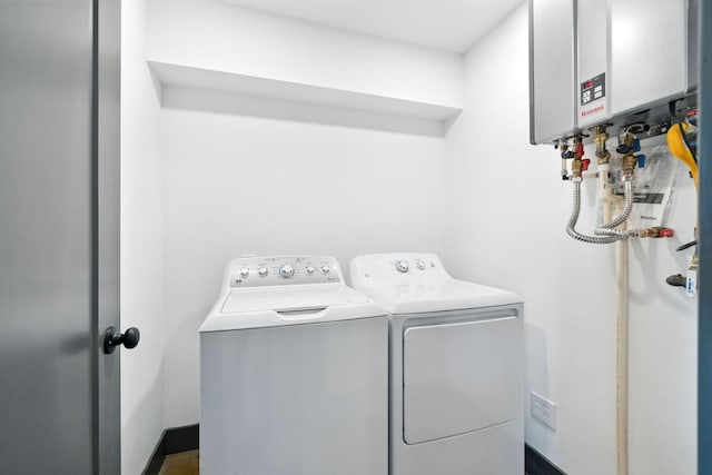 23795 Deer Canyon Rd, Millville, CA 96062 - laundry room featuring washing machine and dryer and water heater