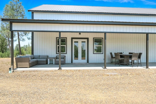 23795 Deer Canyon Rd, Millville, CA 96062 - back of house featuring an outdoor living space, french doors, and a patio area