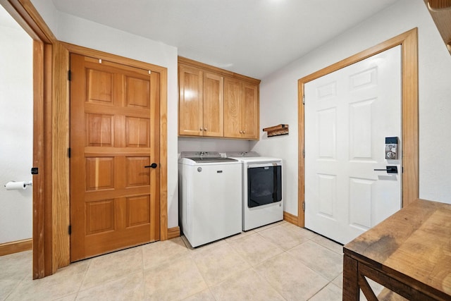 23795 Deer Canyon Rd, Millville, CA 96062 - laundry area with cabinet space, separate washer and dryer, and light tile patterned flooring