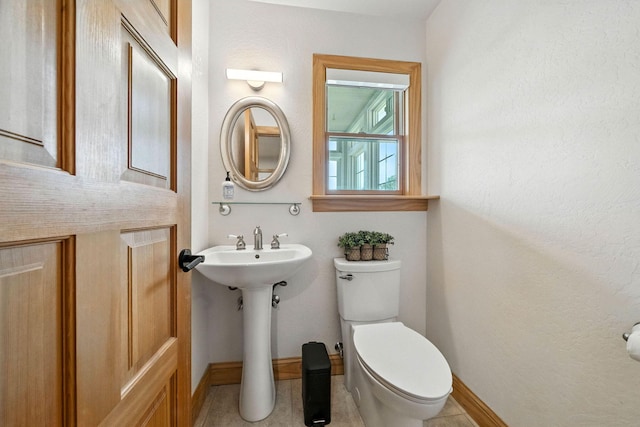 23795 Deer Canyon Rd, Millville, CA 96062 - bathroom with toilet and baseboards