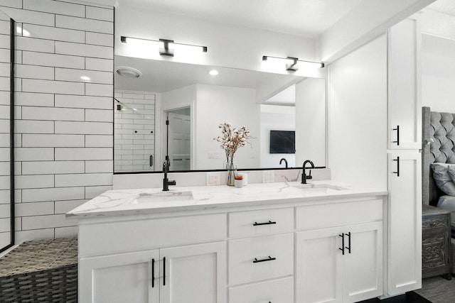 23795 Deer Canyon Rd, Millville, CA 96062 - bathroom featuring double vanity and a tile shower