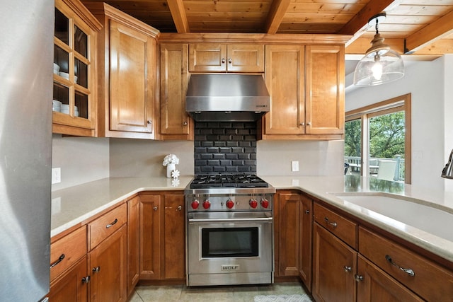 23795 Deer Canyon Rd, Millville, CA 96062 - kitchen with appliances with stainless steel finishes, under cabinet range hood, a wood ceiling with exposed beams, tasteful backsplash, and light countertops