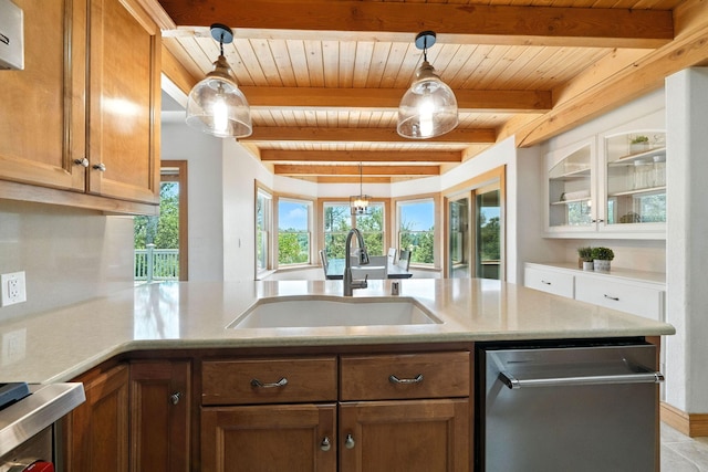 23795 Deer Canyon Rd, Millville, CA 96062 - kitchen featuring a wooden ceiling with exposed beams, a peninsula, pendant lighting, stainless steel dishwasher, and brown cabinetry