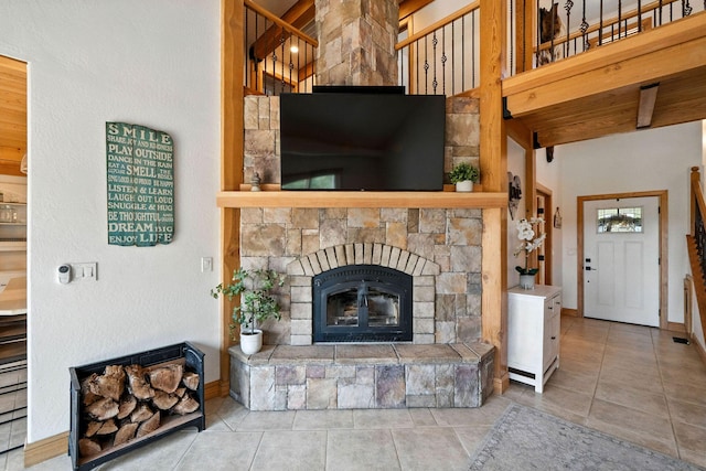 23795 Deer Canyon Rd, Millville, CA 96062 - unfurnished living room with tile patterned floors and a fireplace
