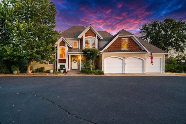 23795 Deer Canyon Rd, Millville, CA 96062 - view of front of home with asphalt driveway, a standing seam roof, a garage, and a shingled roof