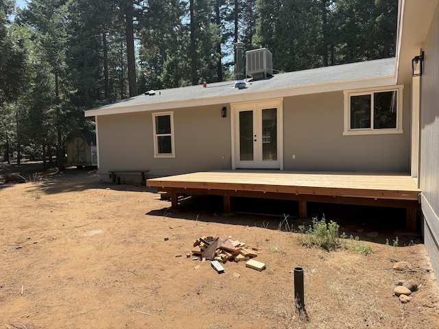 10360 Ritts Mill Rd, Shingletown, CA 96088 - rear view of house with french doors and a deck