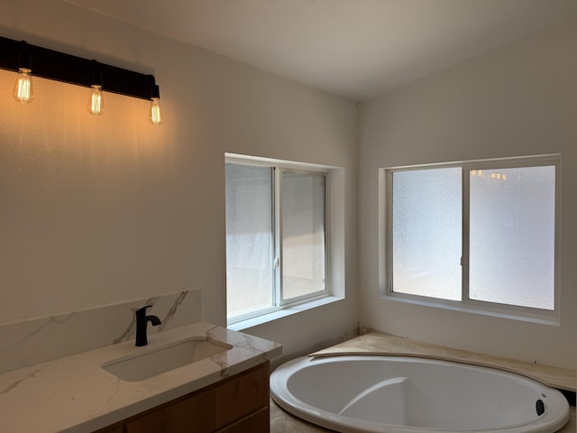 10360 Ritts Mill Rd, Shingletown, CA 96088 - full bath with healthy amount of natural light, a garden tub, and vanity