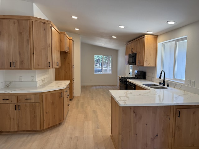 10360 Ritts Mill Rd, Shingletown, CA 96088 - kitchen featuring black appliances, light wood finished floors, a peninsula, light stone countertops, and recessed lighting