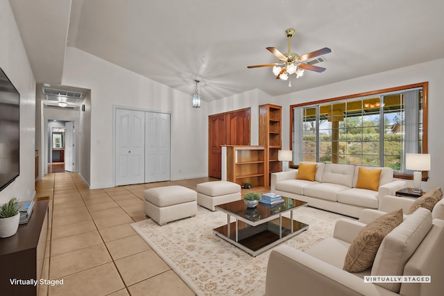12526 Glide Way, Redding, CA 96003 - living area with light tile patterned floors, ceiling fan, vaulted ceiling, attic access, and plenty of natural light