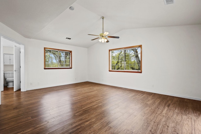 12526 Glide Way, Redding, CA 96003 - unfurnished room with lofted ceiling, plenty of natural light, wood finished floors, and a ceiling fan