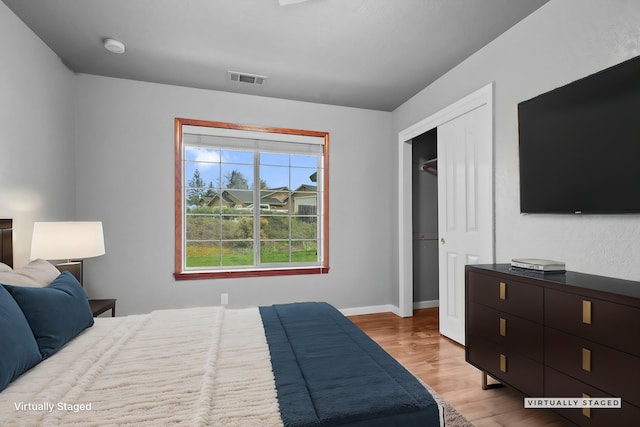 12526 Glide Way, Redding, CA 96003 - bedroom with wood finished floors and a closet