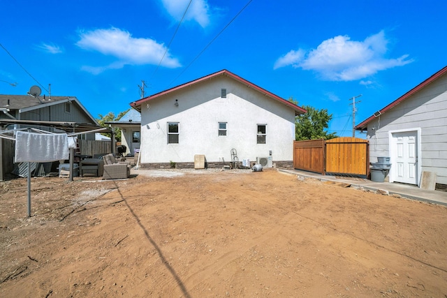 1635 Pleasant St, Redding, CA 96001 - back of property with a patio and stucco siding