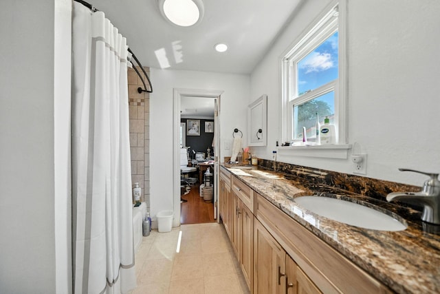 1635 Pleasant St, Redding, CA 96001 - full bathroom featuring double vanity and tile patterned flooring