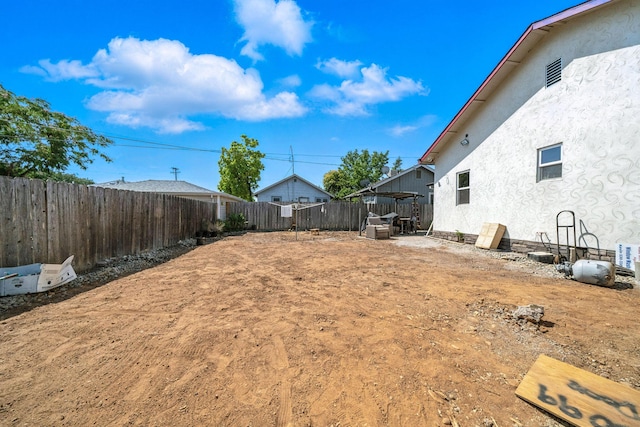 1635 Pleasant St, Redding, CA 96001 - fenced backyard with a patio