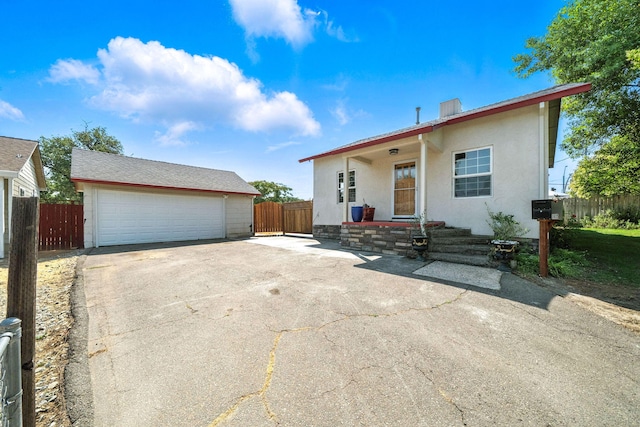 1635 Pleasant St, Redding, CA 96001 - view of front facade featuring stucco siding and a garage