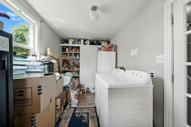 1635 Pleasant St, Redding, CA 96001 - washroom with washer and clothes dryer and stone finish flooring