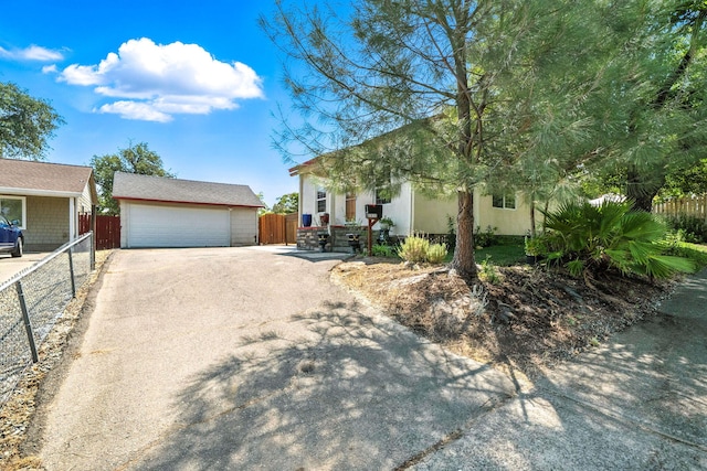 1635 Pleasant St, Redding, CA 96001 - view of front facade with a detached garage