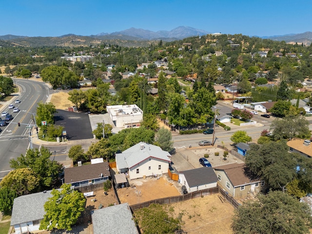 1635 Pleasant St, Redding, CA 96001 - aerial perspective of suburban area featuring a mountain backdrop