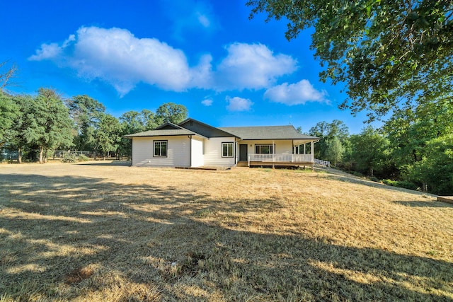18435 Danielle Way, Cottonwood, CA 96022 - back of house with a yard and a porch