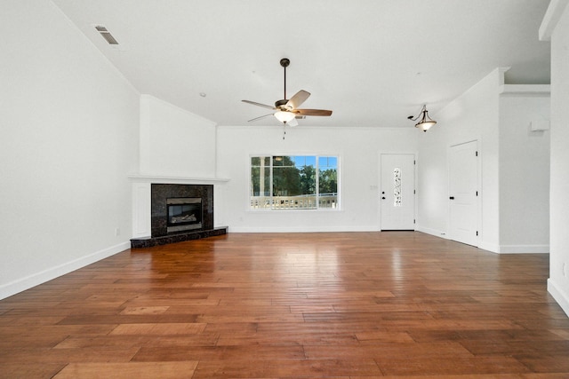 18435 Danielle Way, Cottonwood, CA 96022 - unfurnished living room featuring a ceiling fan, wood finished floors, a premium fireplace, and vaulted ceiling