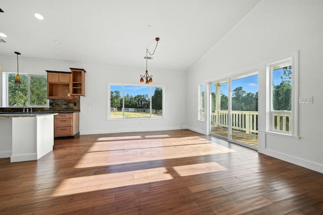 18435 Danielle Way, Cottonwood, CA 96022 - unfurnished dining area featuring healthy amount of natural light, lofted ceiling, dark wood-style floors, recessed lighting, and a chandelier