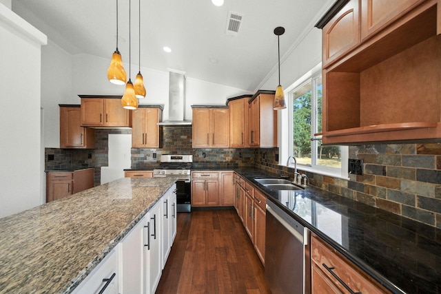 18435 Danielle Way, Cottonwood, CA 96022 - kitchen featuring stainless steel appliances, wall chimney range hood, crown molding, dark stone counters, and lofted ceiling