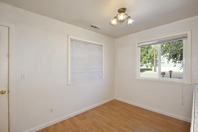 210 Sherman St, Yreka, CA 96097 - empty room with light wood-style floors and baseboards