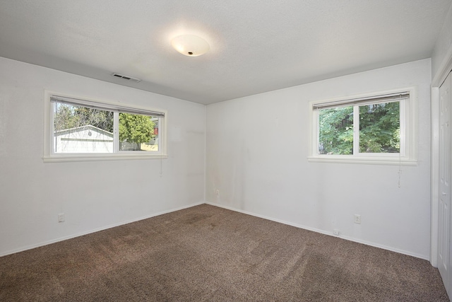 210 Sherman St, Yreka, CA 96097 - carpeted spare room featuring baseboards