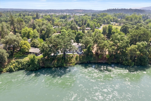 2949 Felstet Ln, Redding, CA 96001 - drone / aerial view of a heavily wooded area and a nearby body of water