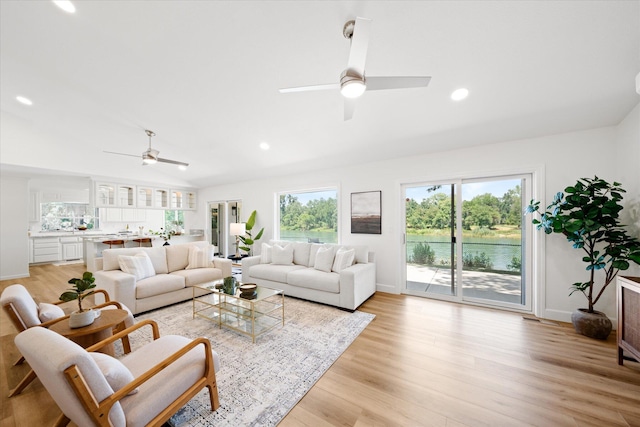 2949 Felstet Ln, Redding, CA 96001 - living room with ceiling fan, plenty of natural light, light wood-style floors, lofted ceiling, and recessed lighting