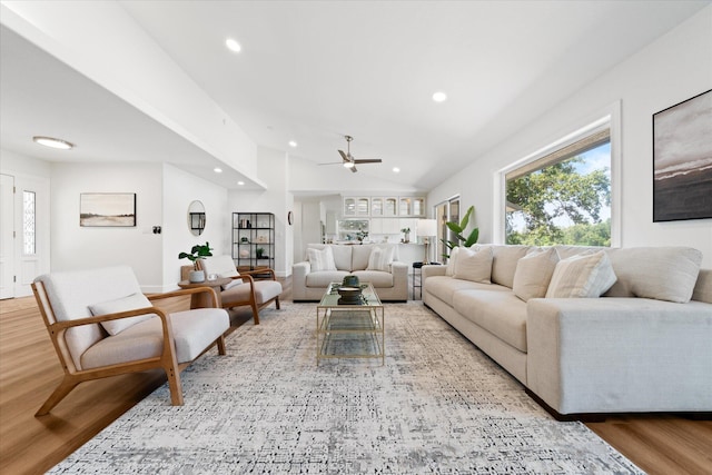 2949 Felstet Ln, Redding, CA 96001 - living area featuring light wood finished floors, recessed lighting, plenty of natural light, ceiling fan, and lofted ceiling
