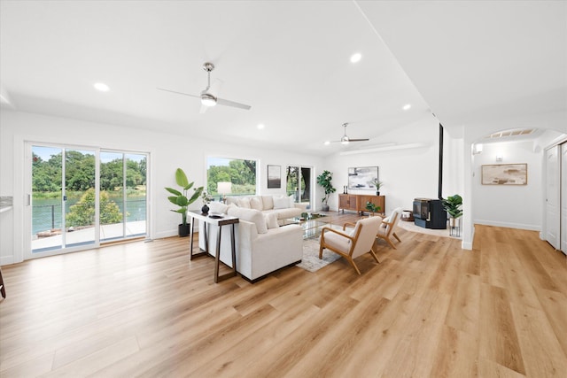 2949 Felstet Ln, Redding, CA 96001 - living area with ceiling fan, recessed lighting, arched walkways, light wood-style floors, and vaulted ceiling