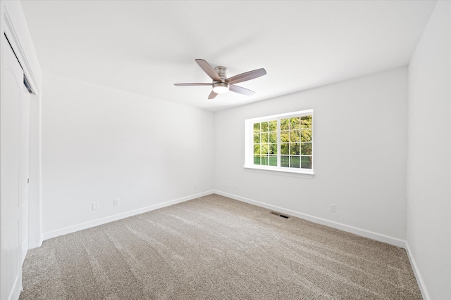 2949 Felstet Ln, Redding, CA 96001 - unfurnished bedroom with carpet floors, a closet, and a ceiling fan