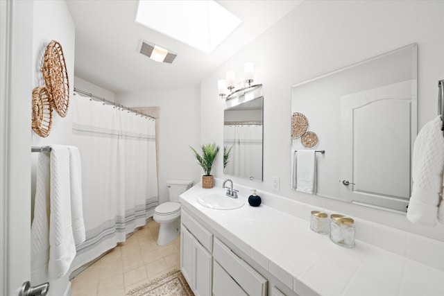 2949 Felstet Ln, Redding, CA 96001 - bathroom with double vanity, tile patterned flooring, a skylight, and a shower with curtain