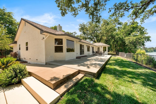 2949 Felstet Ln, Redding, CA 96001 - rear view of house featuring a chimney, a patio area, crawl space, and stucco siding