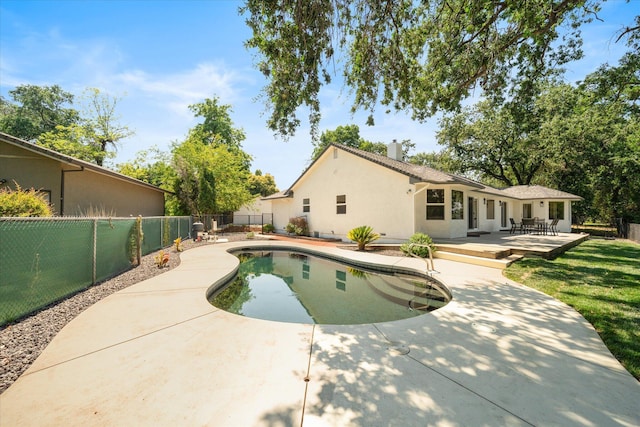 2949 Felstet Ln, Redding, CA 96001 - view of swimming pool with a fenced backyard, a wooden deck, and a patio