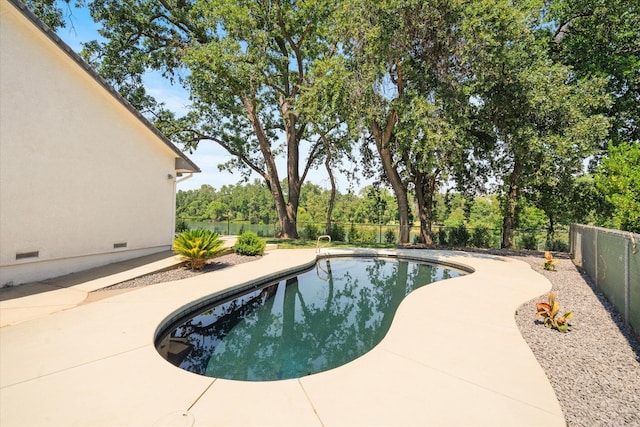 2949 Felstet Ln, Redding, CA 96001 - view of swimming pool featuring a fenced backyard, a patio area, and view of scattered trees