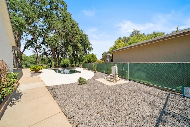 2949 Felstet Ln, Redding, CA 96001 - fenced backyard featuring a patio area