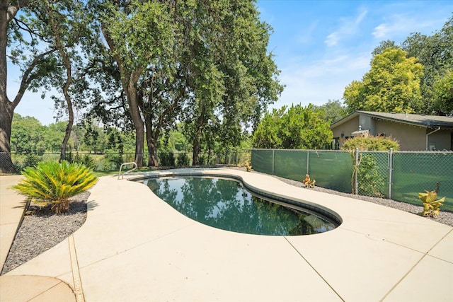 2949 Felstet Ln, Redding, CA 96001 - view of swimming pool with a patio, a fenced backyard, and view of scattered trees