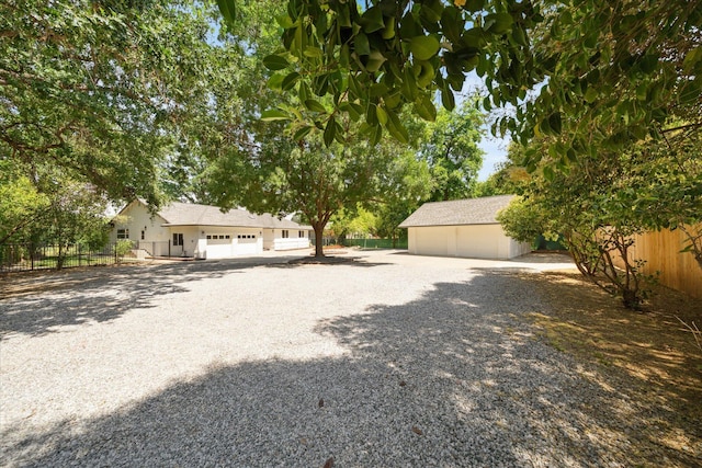 2949 Felstet Ln, Redding, CA 96001 - view of front of property featuring a detached garage and an outdoor structure