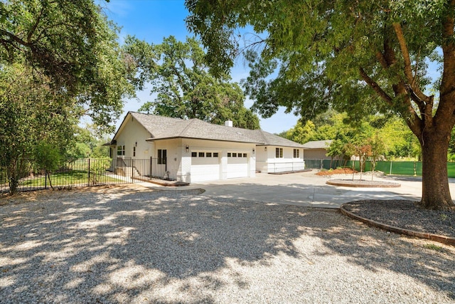 2949 Felstet Ln, Redding, CA 96001 - view of property exterior featuring concrete driveway and a garage