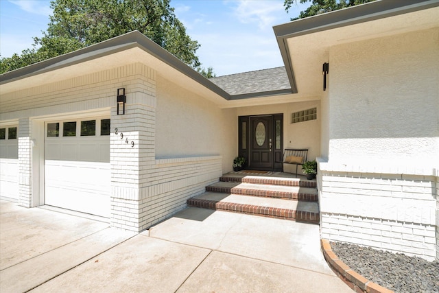 2949 Felstet Ln, Redding, CA 96001 - property entrance featuring brick siding, stucco siding, and a garage