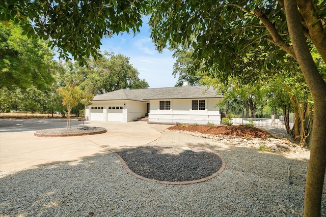 2949 Felstet Ln, Redding, CA 96001 - single story home with driveway, a garage, and stucco siding