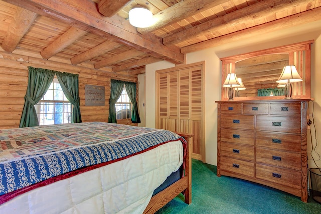 27401 Goodman Rd, Fall River Mills, CA 96028 - carpeted bedroom with a wooden ceiling with exposed beams, a closet, and log walls