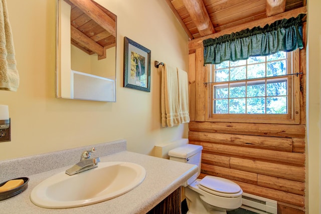27401 Goodman Rd, Fall River Mills, CA 96028 - bathroom with a wooden ceiling with exposed beams, vanity, and baseboard heating