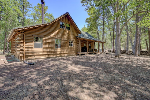 27401 Goodman Rd, Fall River Mills, CA 96028 - rear view of house with log siding