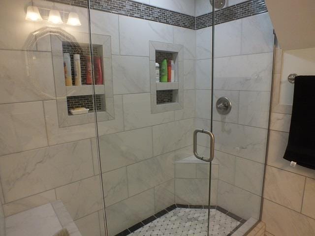 bathroom featuring walk in shower