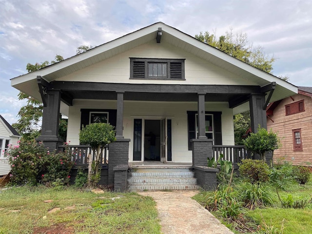 bungalow-style home with covered porch